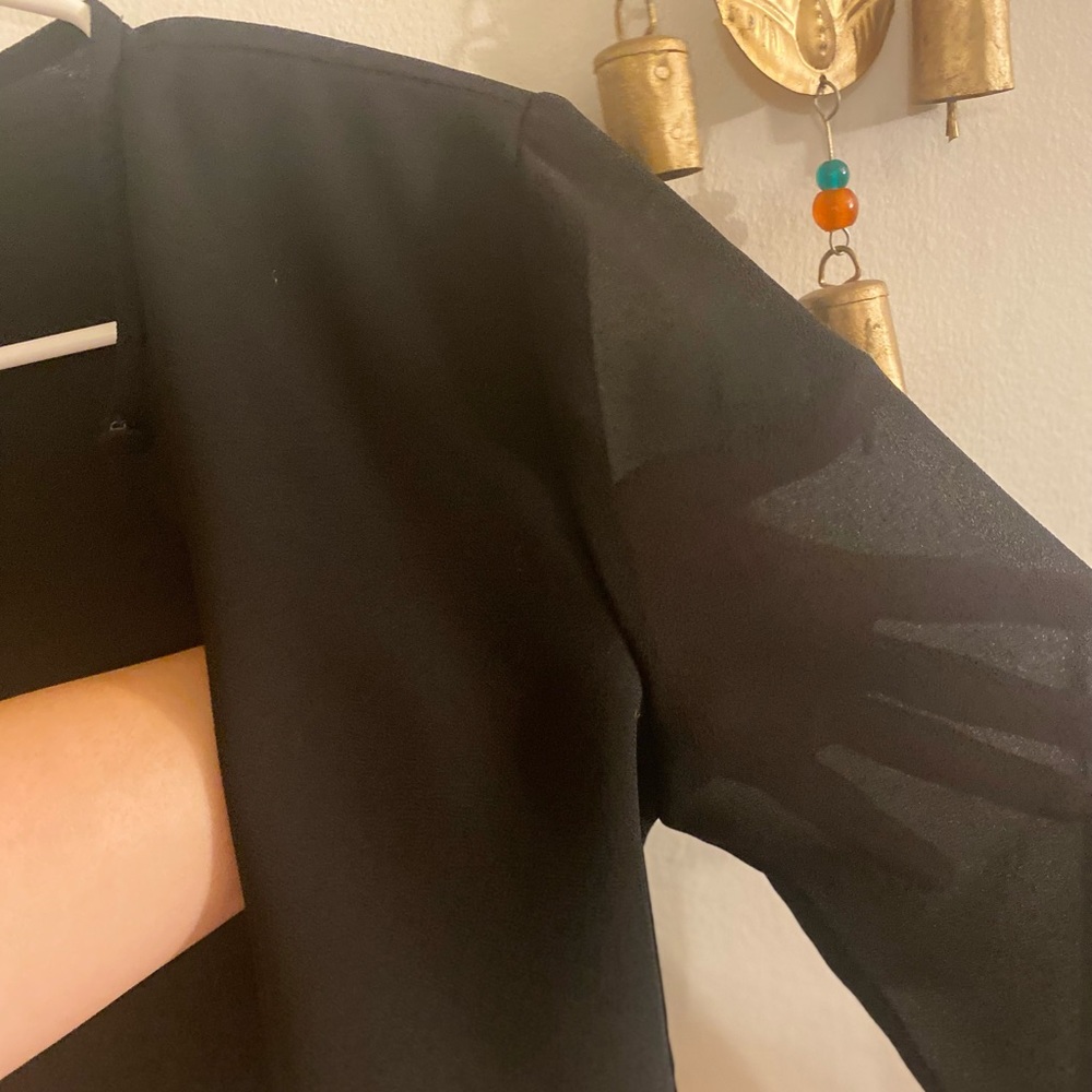 Black top classy material with see through sleeves